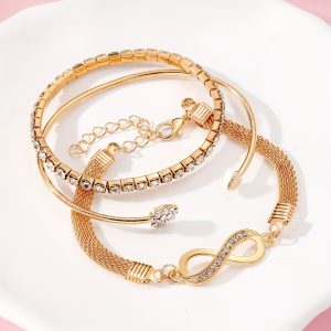 A Set of Three Women'S Bracelets And Bangles Featuring Wireless Symbols And Heart Designs Adorned with Rhinestones.