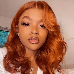 The Popular Synthetic Hair Wigs for Women in Europe and America - 14-inch Orange Mid-length Wavy Wig. This Style Is Extremely Popular in Africa. It Is Suitable for Various Occasions Such as Daily Life, Parties, and Gatherings.